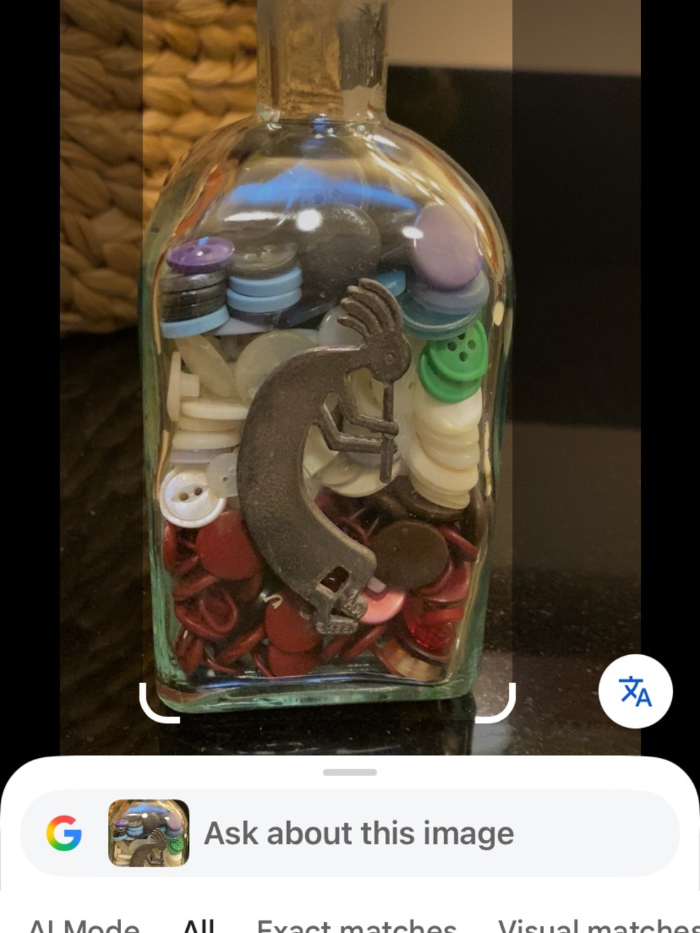 Kokopelli signed HH 1994- Glass Bottle Filled with Colorful Buttons